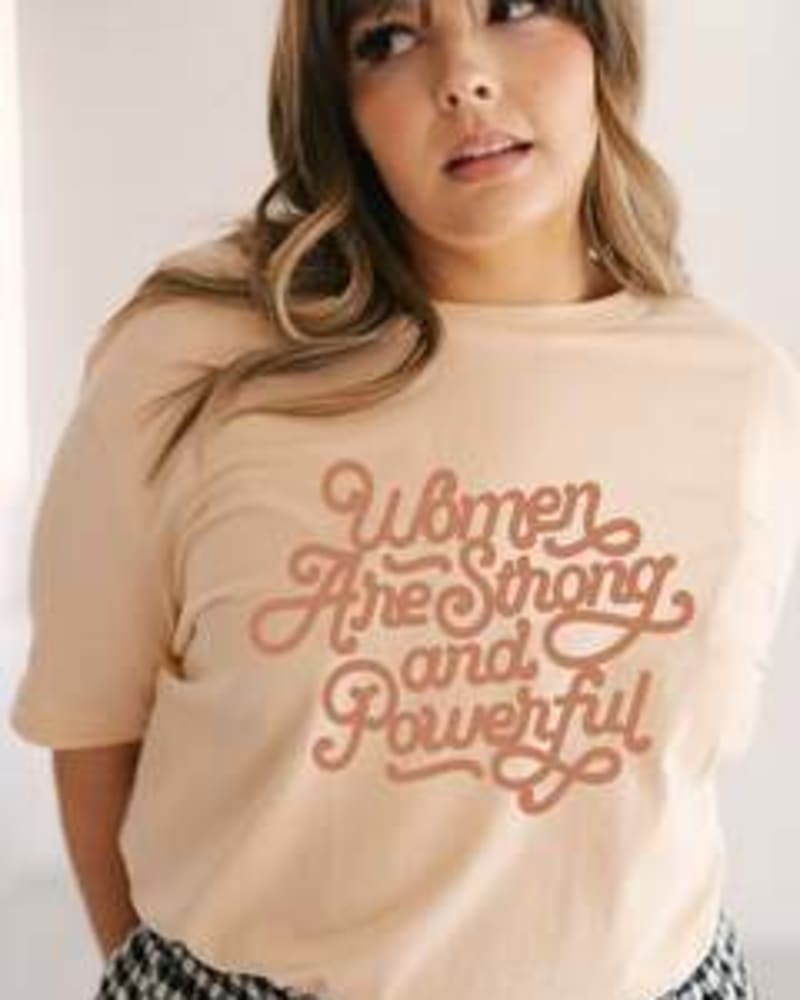 Front of a model wearing a size Large Women are Strong and Powerful Graphic Tee in Sunkiss by Polished Prints. | dia_product_style_image_id:239783